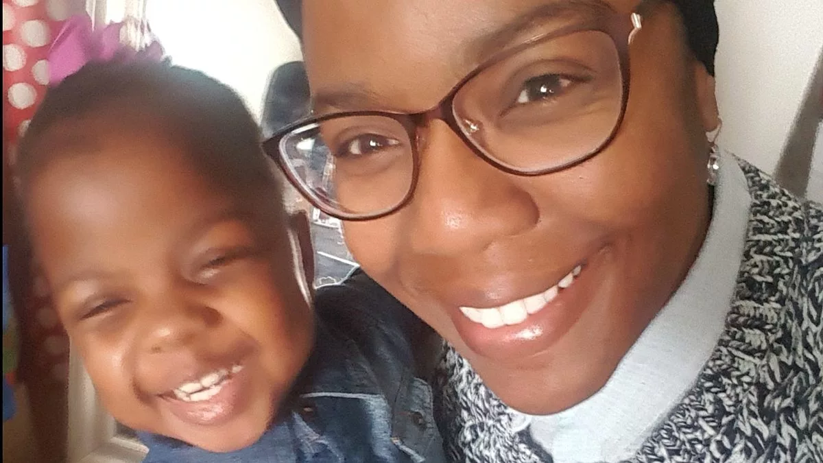 Smiling Adult and Child