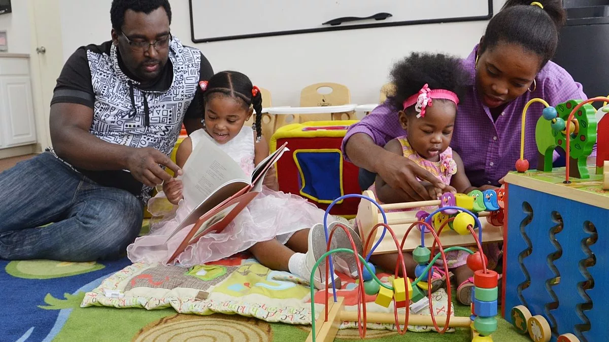 Miriam-and-Wood.jpg Family Playing at Home